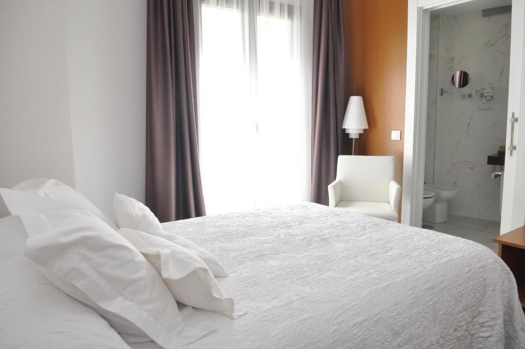Toral Hotel León Habitación foto